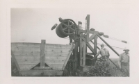 Two men working at the Alouette Peat Farm c.1940s