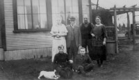 William, Jeanin, and Robert Struthers outside of store in 1924c.