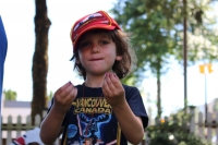 A little boy enjoying his snack during Heritage Thursday 2018