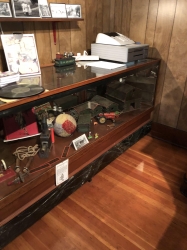 Photo of the toy case in the parlor before