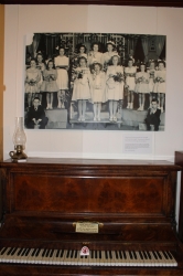 Photo of the piano and new image in the room