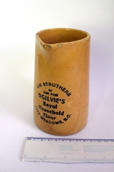 A yellow stoneware jug