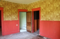 Alvo Von Alvensleben House interior living/parlor room with a door leading to the upstairs of the house